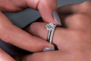 Close-up of a diamond ring under soft lighting, highlighting brilliance in a stone under 1 carat. 