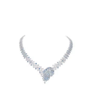 Arctic Bloom Necklace Suite in sterling silver with platinum plating and lab-created sapphires, resembling delicate frozen petals.