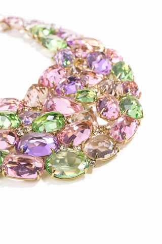 A necklace adorned with vibrant multicolored stones, showcasing a variety of hues and textures.