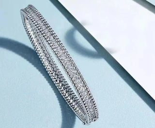 Clair de Lune Bracelet in rose or white gold finish with Moissanite – luminous sterling silver bracelet with celestial charm.