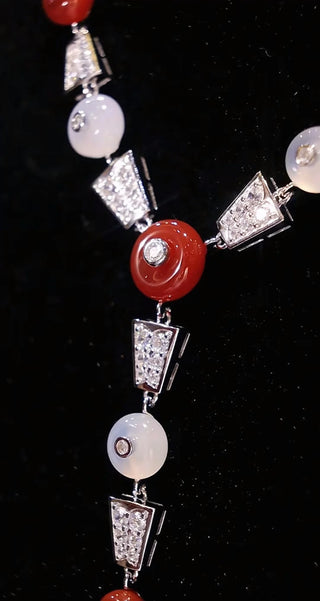 Crimson Bind Necklace for women, made from 925 sterling silver with platinum plating and a red lab-created sapphire. Elegant Y-shaped design with a modern twist.