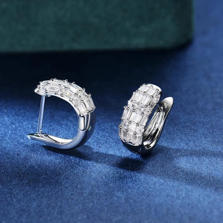 Duchess of Ice Earrings – Sterling silver earrings with white lab-created sapphires, offering a crisp, refined sparkle inspired by winter’s elegance.