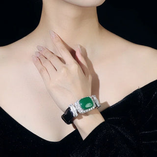 Emerald Chalcedony Wristband with green chalcedony center, framed by white sapphires, set in sterling silver with platinum plating.