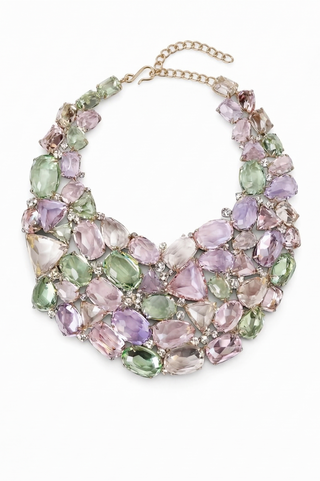 A decorative multi-layered necklace with an array of green and purple stones, adding a pop of color to any outfit.
