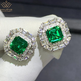 Gemini Green Studs – 9K white gold earrings with 3.8-carat emerald and lab-created sapphires, offering vibrant elegance and subtle sparkle.