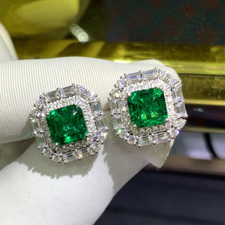 Gemini Green Studs – 9K white gold earrings with 3.8-carat emerald and lab-created sapphires, offering vibrant elegance and subtle sparkle.