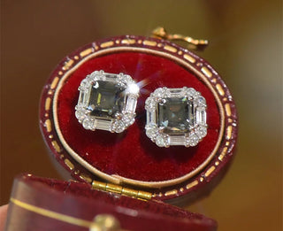 Greylight Crown Studs in sterling silver with Moissanite stones, featuring a platinum-plated finish and a regal crown-inspired design.