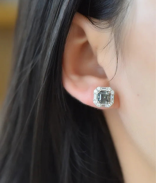 Greylight Crown Studs in sterling silver with Moissanite stones, featuring a platinum-plated finish and a regal crown-inspired design.