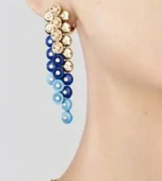 Imperial Dusk stud earrings in 925 sterling silver set with deep lab-created sapphire stones.