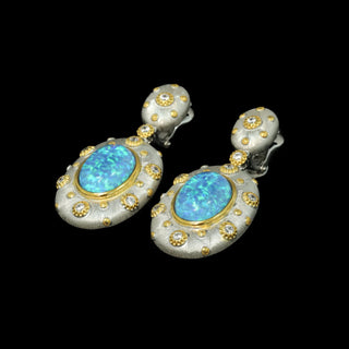 Opaline Skies Earrings in sterling silver with lab-created sapphires, offering a soft, serene glow for an elegant look.