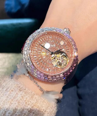 Rosaline women’s quartz watch featuring stainless steel case, sapphire crystal dial, and purple leather strap.