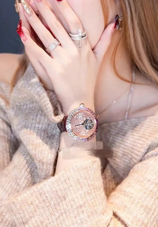 Rosaline women’s quartz watch featuring stainless steel case, sapphire crystal dial, and purple leather strap.