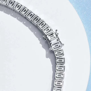 Sapphire Embrace Bracelet in sterling silver with lab sapphires – elegant women’s sapphire bangle for timeless everyday wear.