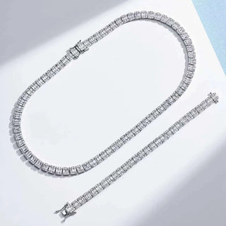 Sapphire Embrace Bracelet in sterling silver with lab sapphires – elegant women’s sapphire bangle for timeless everyday wear.