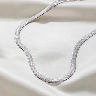 Serpentina Necklace in sterling silver with rose gold, 18K gold, and 24K gold finishes, designed for women. Elegant and timeless design