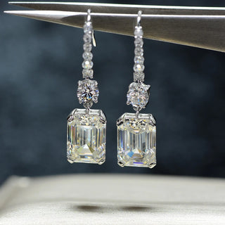 Sterling Grace Earrings in 925 sterling silver with emerald-cut lab sapphires, offering timeless elegance and versatility.