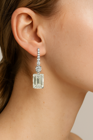 Sterling Grace Earrings in 925 sterling silver with emerald-cut lab sapphires, offering timeless elegance and versatility.