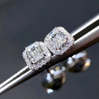 Twilight Crest Studs in sterling silver with VVS moissanite stones, finished with white gold plating for a refined, radiant glow.