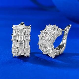 Whispers of Ice Earrings – Sterling silver earrings with lab-created sapphires, offering a delicate glow inspired by winter’s frost and elegance.