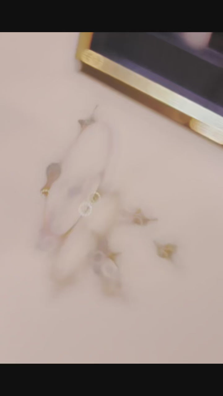 Azzallure Pierced Infinity Ring featuring a gold-finished open infinity symbol pavé set with lab-created sapphires on sterling silver.

