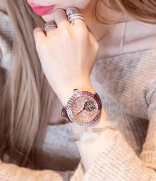 Rosaline women’s quartz watch featuring stainless steel case, sapphire crystal dial, and purple leather strap.